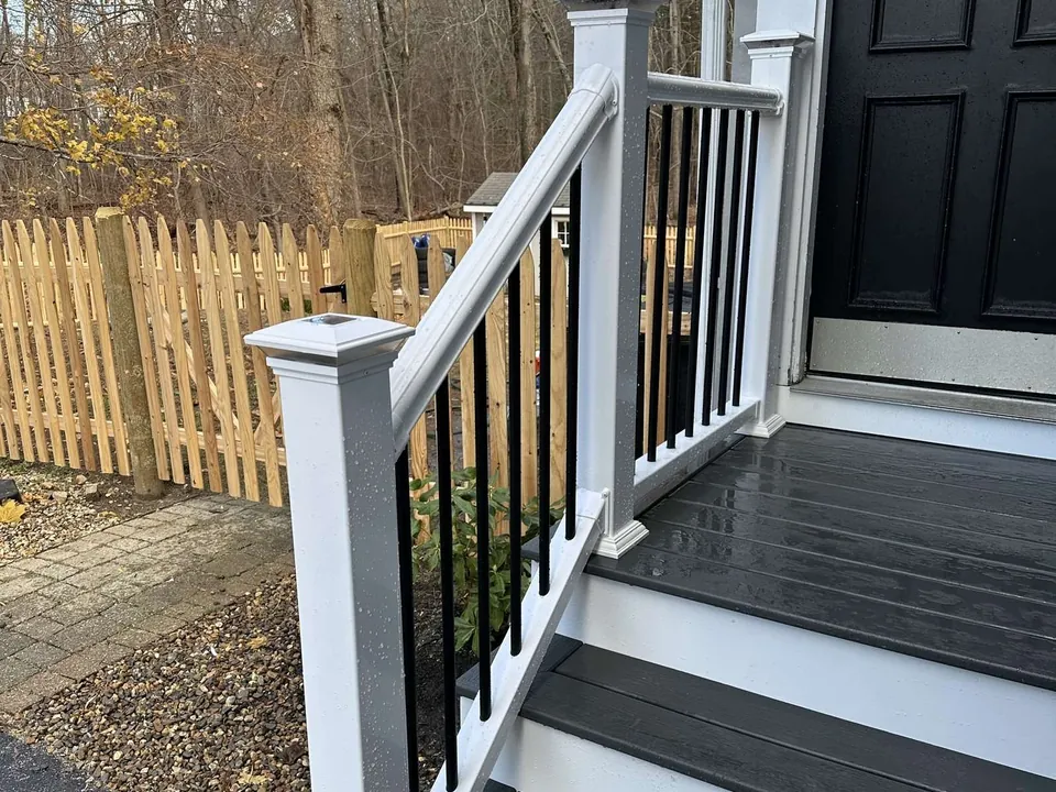 Composite entry steps with white railing and black balusters, Reading