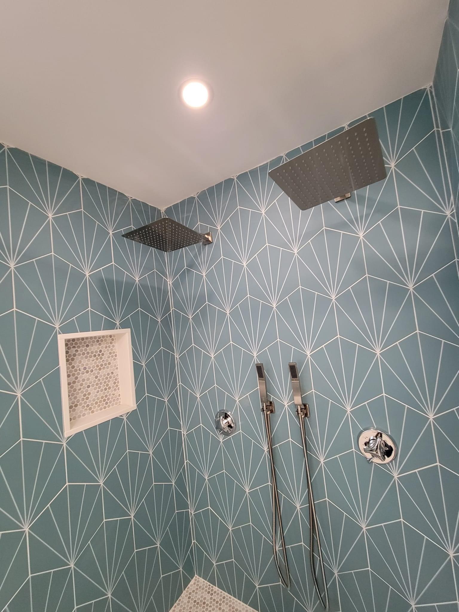 Teal fan-pattern-tile shower with dual rain heads and handheld sprayers, North Reading
