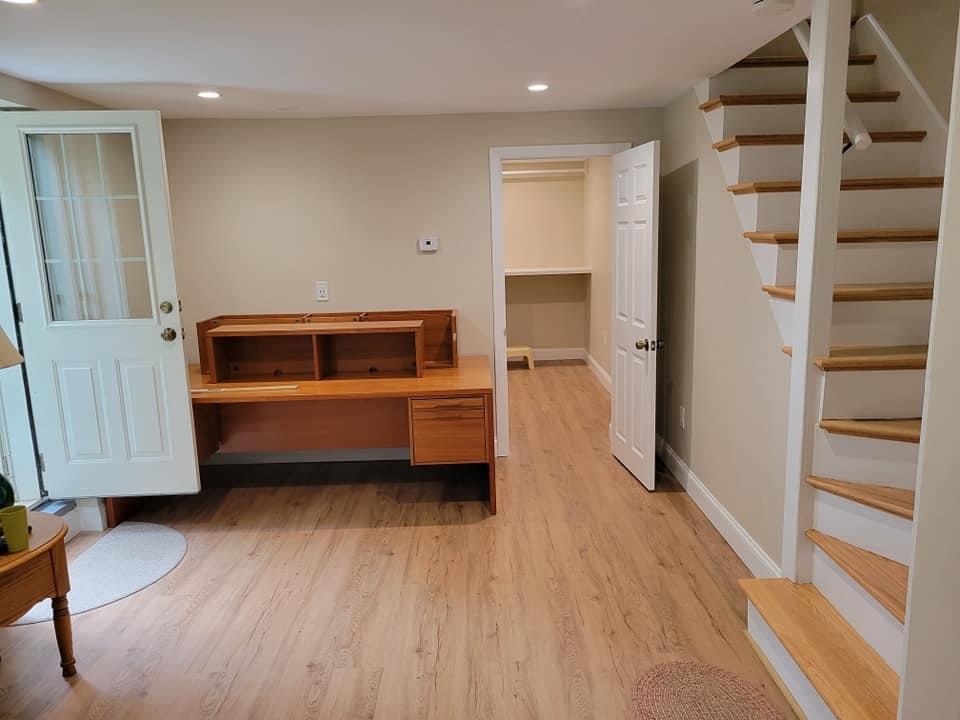 Basement entry with staircase, closet and new flooring, Lynnfield